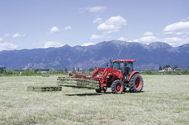 Koch uses a bale accumulator to keep his small square bales in groups of 10.